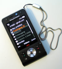 sony ericssion w980 flip phone - close up